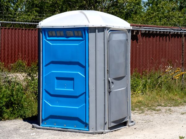Construction porta potty on a jobsite in Georgia and the Southeast
